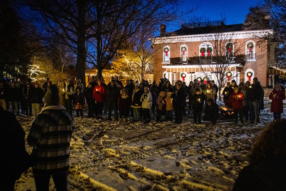 Northwest community members annually gather at the Thomas Gaunt House for the President’s Tree Lighting to usher in the holiday season on the campus. (Photo by Lauren Adams/Northwest Missouri State University)