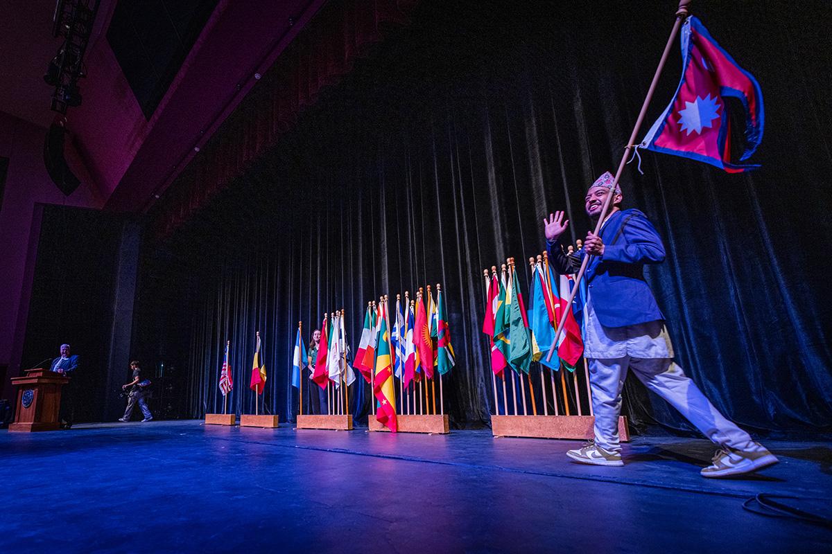 International students represent their home countries during Northwest's annual International Flag-Raising Ceremony during Homecoming week. (Photo by Todd Weddle/Northwest Missouri State University)